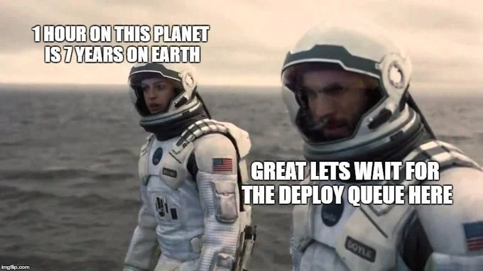 Meme joking about waiting for game server deployment using time dilation logic.