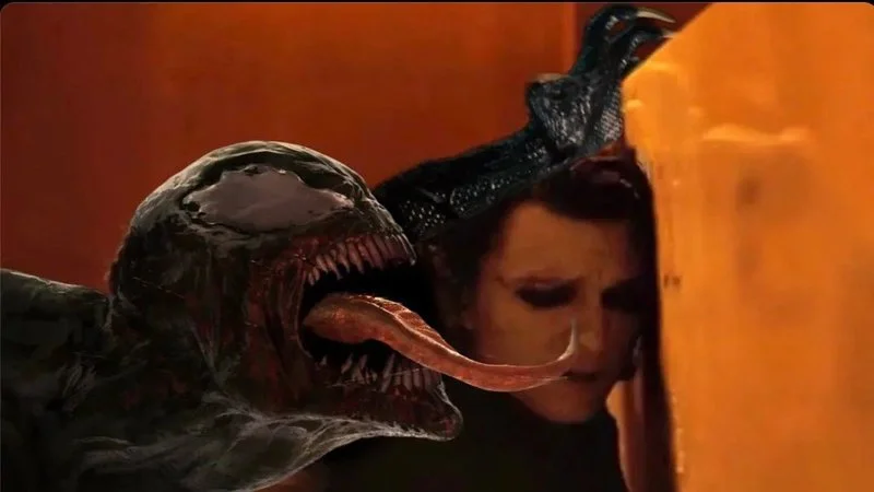 The visual: Venom's suggestive pose represents the meme.