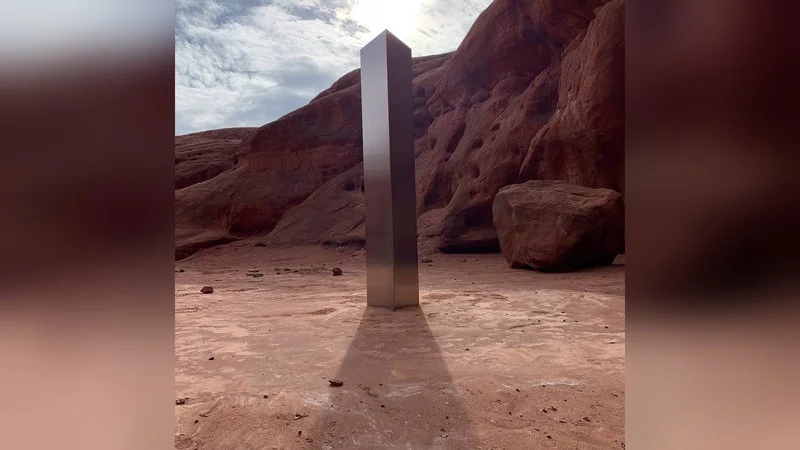 The iconic hero image: monolith in canyon landscape.