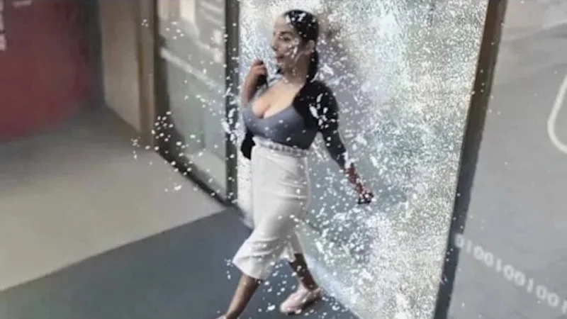 The iconic template: woman shattering glass.