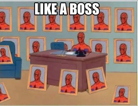 Spider-Man at desk with self-portraits.