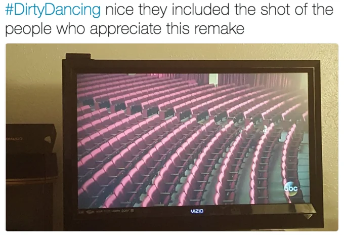 A viewer mocks the low audience turnout for ABC's Dirty Dancing remake by tweeting a photo of empty theater seats.