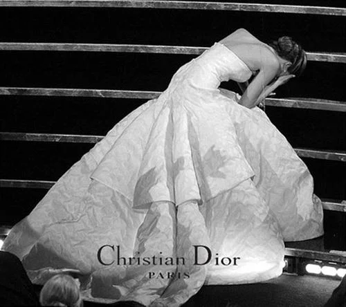 Jennifer Lawrence's famous fall while ascending the stairs to accept her Best Actress Oscar at the 85th Academy Awards, styled as a Christian Dior advertisement.