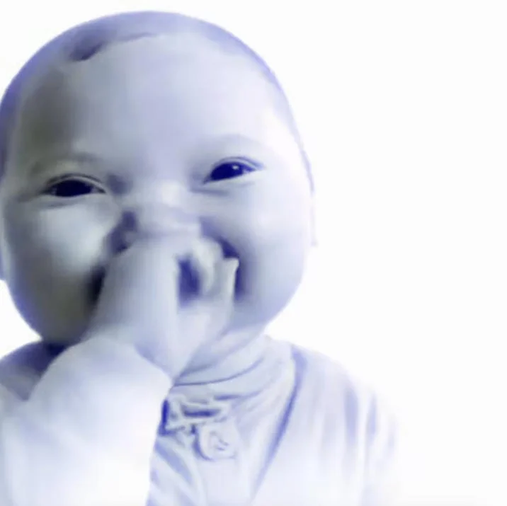 A color-inverted edit of the AI Baby image with a blue tint.