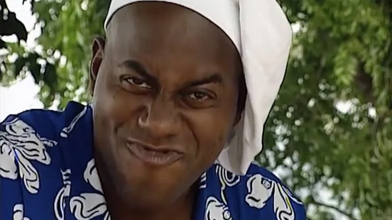 The iconic close-up of Ainsley Harriott from 'Ainsley's Barbecue Bible' that became a staple of the meme.