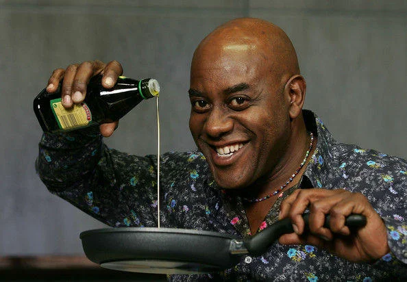 The 'oil up' promotional photo of Ainsley Harriott that became one of the most widely memed images in the series.