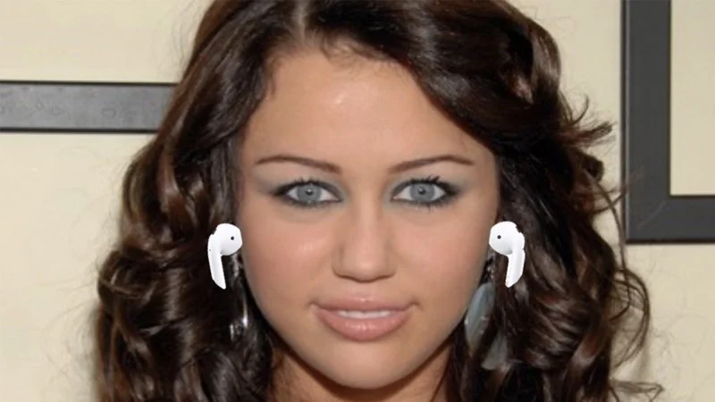 The iconic AirPods flexing image featuring Miley Cyrus with AirPods photoshopped onto her ears.