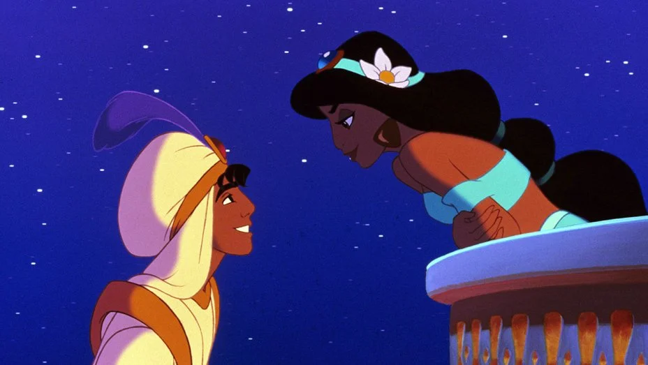 A romantic scene from Disney's 1992 animated Aladdin, featuring the title character and Princess Jasmine on her palace balcony.