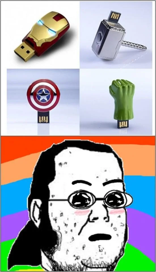 A meme pairing Marvel-themed USB drives with the Amazed Face reaction to express excitement over geeky gadgets.