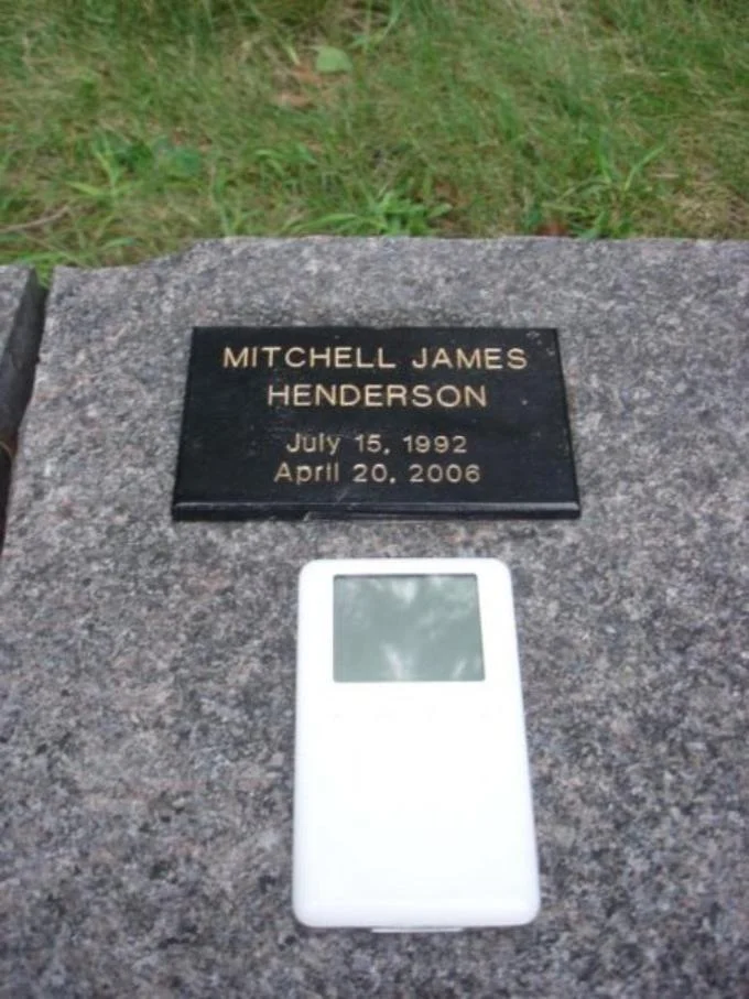 The gravestone of Mitchell Henderson, the 7th-grader whose 2006 suicide and misspelled MySpace tribute ('he was such an hero') originated the meme.