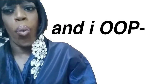 Person with shocked expression wearing blue hoodie with 'and i OOP' text overlay