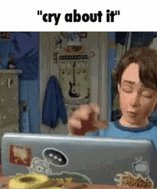 A popular 'cry about it' variant of the Andy Closing Laptop reaction meme.