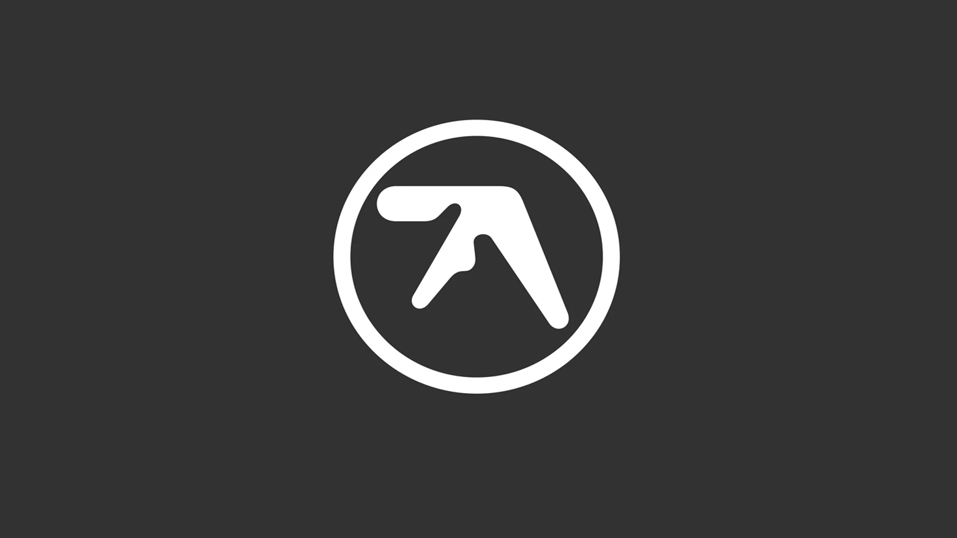 The signature Aphex Twin logo designed by Paul Nicholson, one of the most recognizable symbols in electronic music.