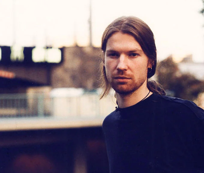 Richard D. James, better known as Aphex Twin, photographed outdoors during his career as an influential electronic music producer.