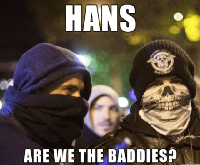 A variant applied to masked black-bloc protesters wearing paramilitary skull imagery.