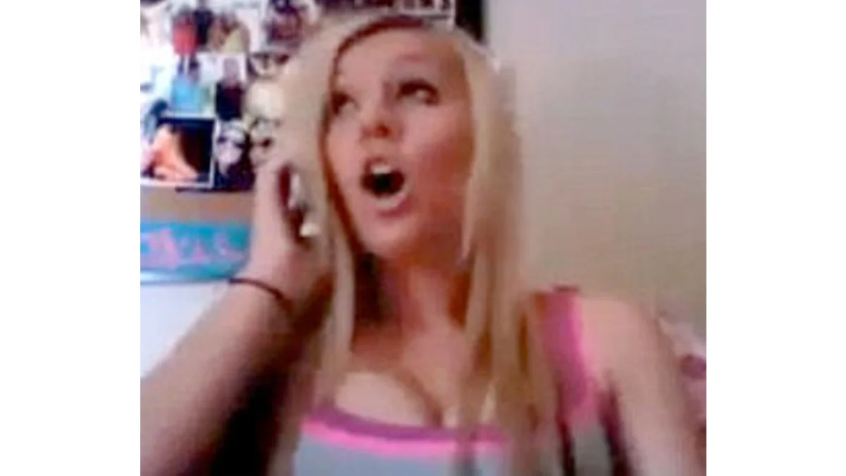 A still evoking Alexandra Wallace's infamous webcam rant, the source of the 'Asians in the Library' meme.