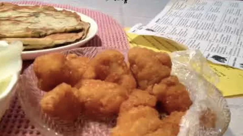 A serving of freshly fried popcorn chicken, the bite-sized snack at the heart of the 'Awesome Popcorn Chicken' meme.