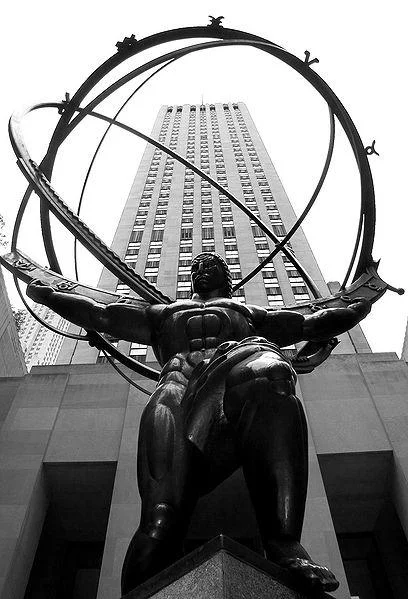 The Atlas statue in New York City, evoking the imagery of Ayn Rand's influential novel 'Atlas Shrugged.'