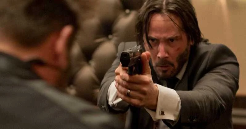 A still of Keanu Reeves as John Wick, the unstoppable assassin whose lethal creativity powers the 'Bad Guys vs. John Wick' meme format.
