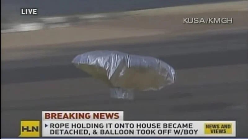 The iconic ascending balloon moment.