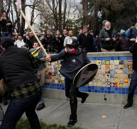 Kyle Chapman, dubbed 'Based Stickman', charges into the crowd at the March 4 Berkeley pro-Trump rally in 2017, the incident that made him a viral internet figure.