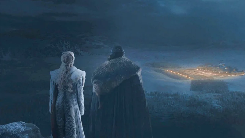 Daenerys Targaryen and Jon Snow look down upon Winterfell as the Army of the Dead approaches in the episode 'The Long Night.'