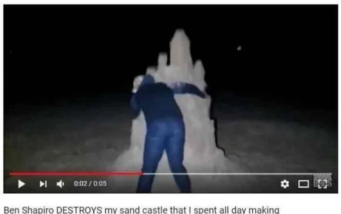 A parody video applying the 'Ben Shapiro DESTROYS' headline format to the literal destruction of a sandcastle.
