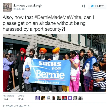 Sikh supporters with campaign banner mocking media whitewashing.