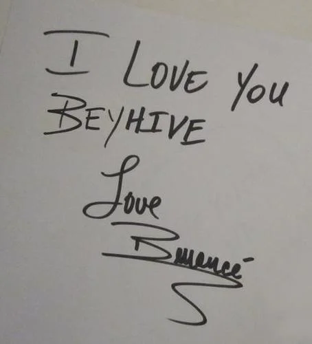 A handwritten message from Beyoncé addressed to the Beyhive, her devoted fanbase.