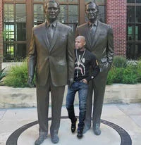 Fan imitation of the original viral meme pose at the library.