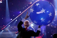 Clinton's iconic joyful moment raising a balloon at the DNC.