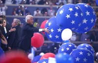 The scale of the balloon drop fills the entire stage.