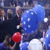 The festive chaos of the balloon drop celebration.