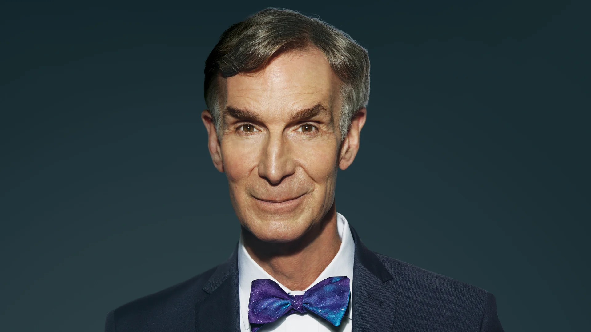Bill Nye, popularly known as 'The Science Guy,' in a promotional portrait wearing his signature bow tie.