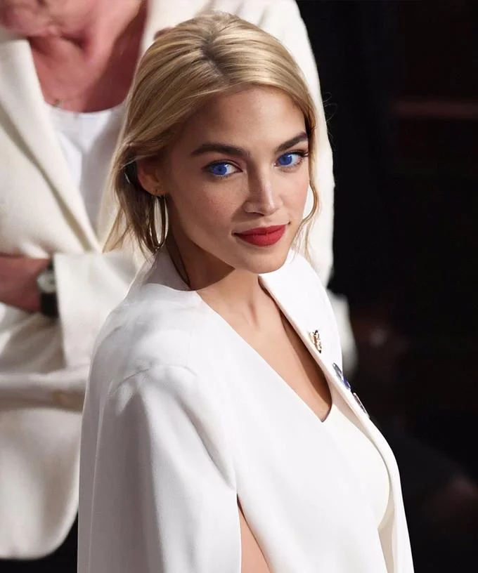 Another viral Blonde AOC variant showing the altered image in a different outfit, continuing the meme's imagery.