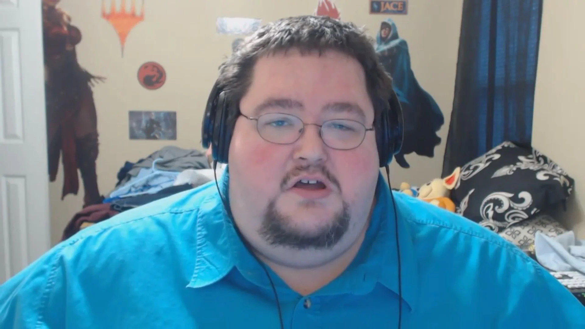 Boogie2988 during one of his signature webcam commentary videos from his bedroom studio.
