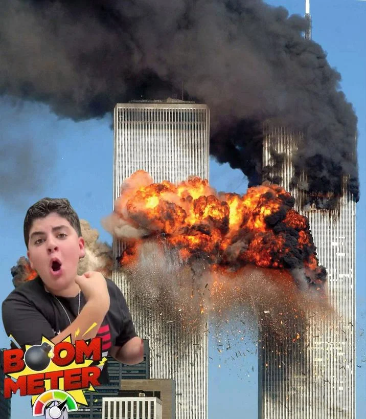 An edgy fan edit combining the Boom Meter reviewer with the September 11 Twin Towers imagery, part of a wave of dark-humor remixes the meme spawned.
