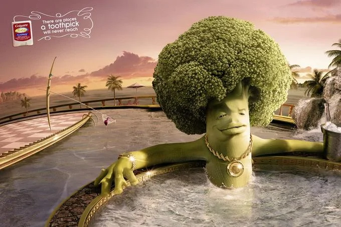 The original Colgate Total dental floss ad that spawned the 'Broccoli in Hot Tub' meme, depicting a smug broccoli man relaxing in a tropical hot tub at sunset.