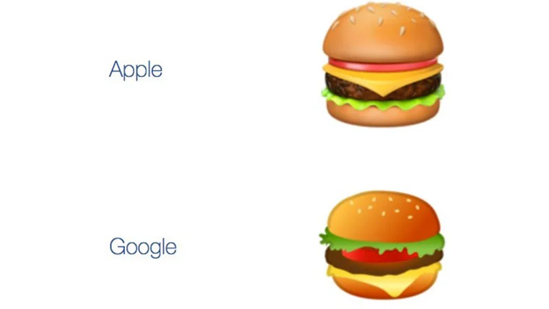 The Apple and Google burger emojis side by side, highlighting the cheese-placement discrepancy that sparked the debate.