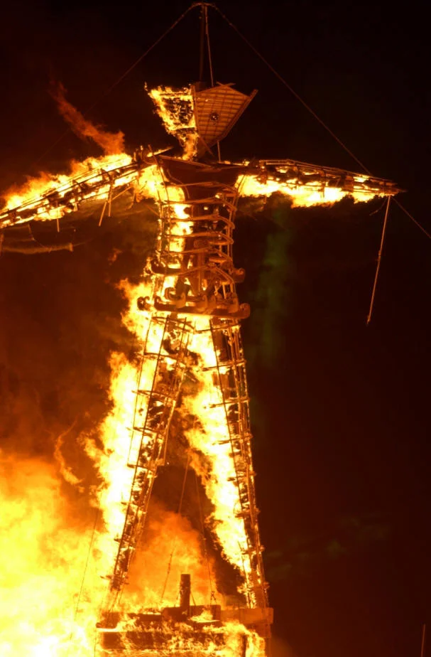 The ceremonial burning of 'The Man' effigy, the namesake climax of the annual Burning Man festival held in Nevada's Black Rock Desert.