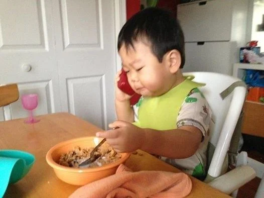Business Baby template with serious eating expression.