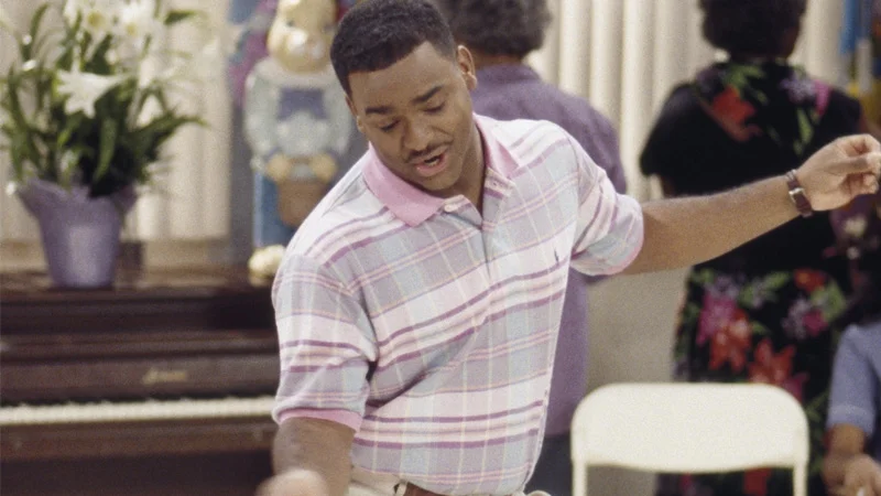 Carlton Banks (Alfonso Ribeiro) performing his iconic dance on The Fresh Prince of Bel-Air, the source of the widely referenced 'Carlton Dance' meme.