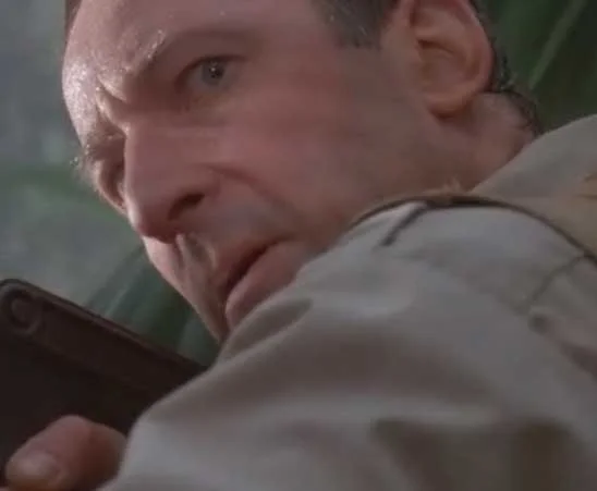 The original 'clever girl' moment from Jurassic Park (1993), as game warden Robert Muldoon realizes the velociraptor has outsmarted him.