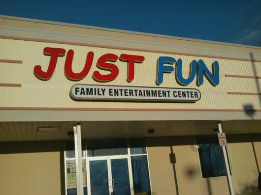 Entertainment center sign in Comic Sans.