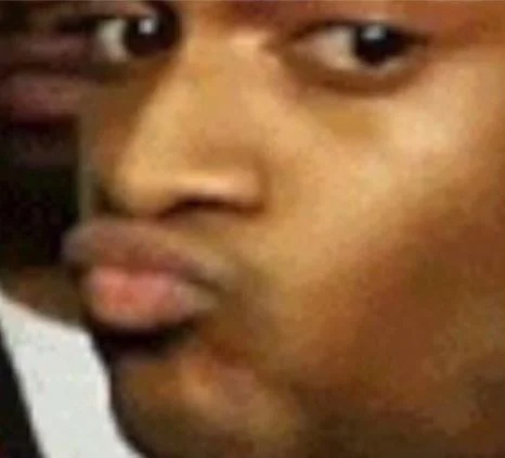 The original close-up of rapper Conceited's skeptical side-eye that fueled the reaction meme.