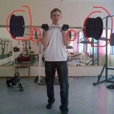 A cringeworthy gym photo edited with drawn-on giant weight plates to exaggerate the lifter's strength.