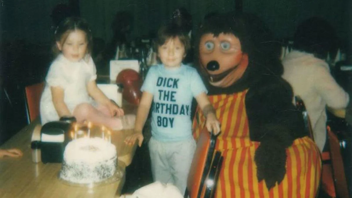Eerie birthday mascot costume cursed image.