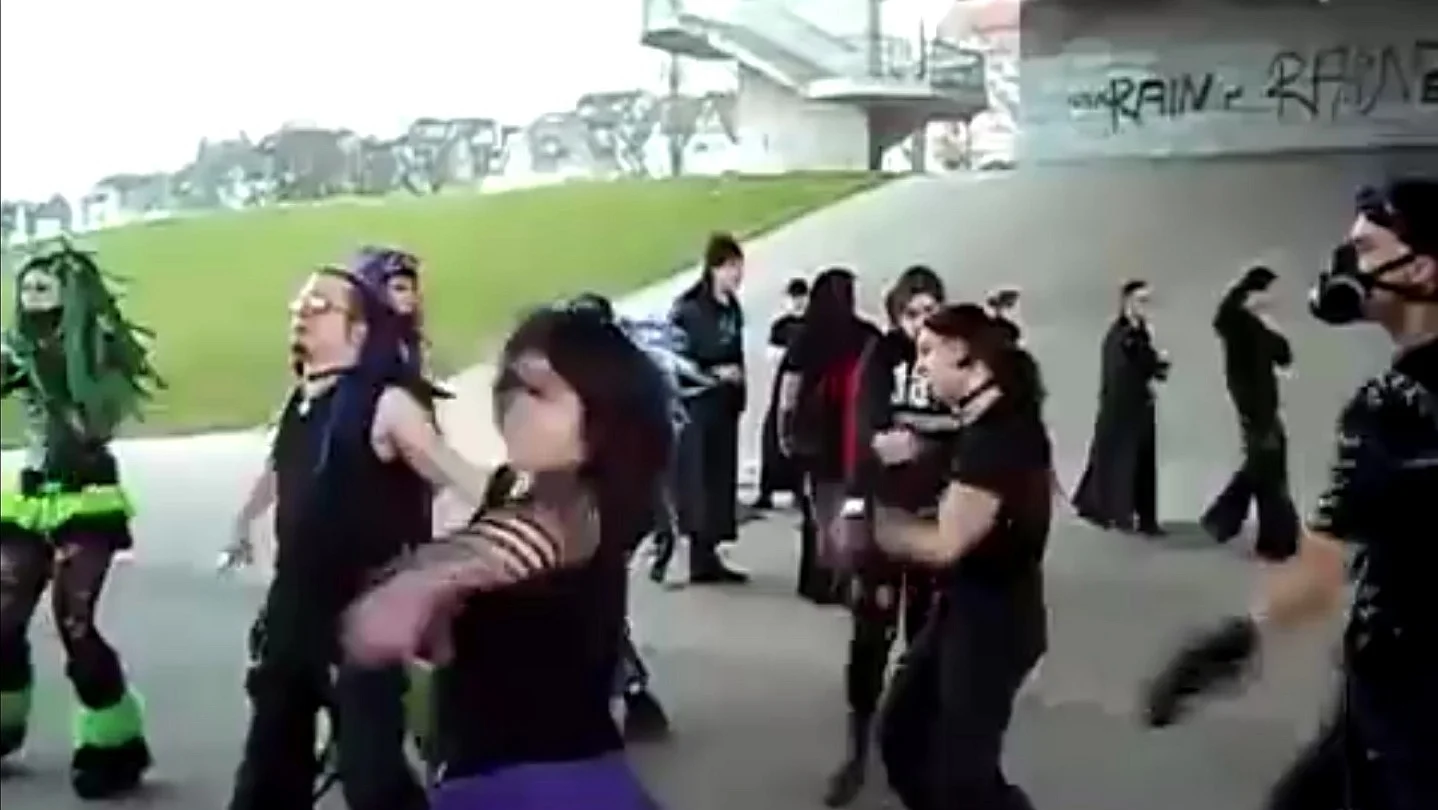 A still from the iconic cybergoth dance party footage that spawned countless remix videos across the internet.