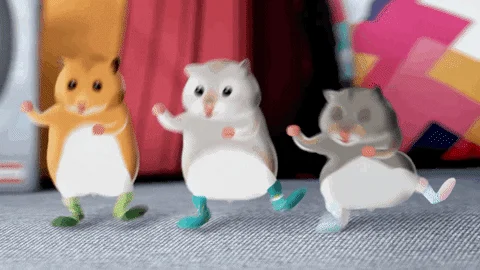 Plush hamster toys in playful dancing poses.