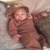 Baby in bear onesie from #DangerousBlackKids protest hashtag.